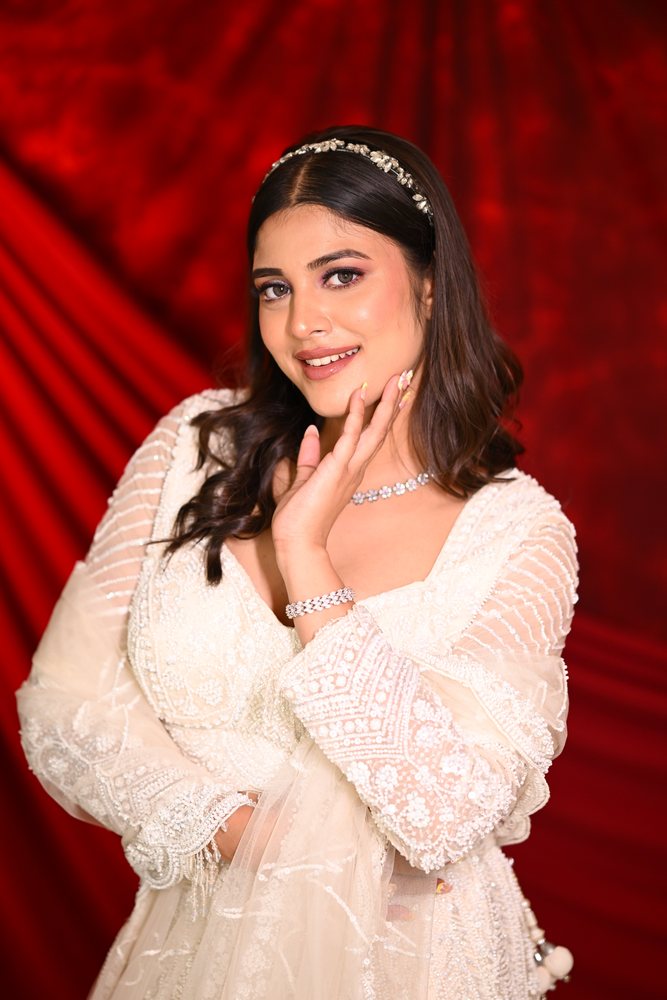 Pre-bridal occasion look — white embroidered outfit, pink eye