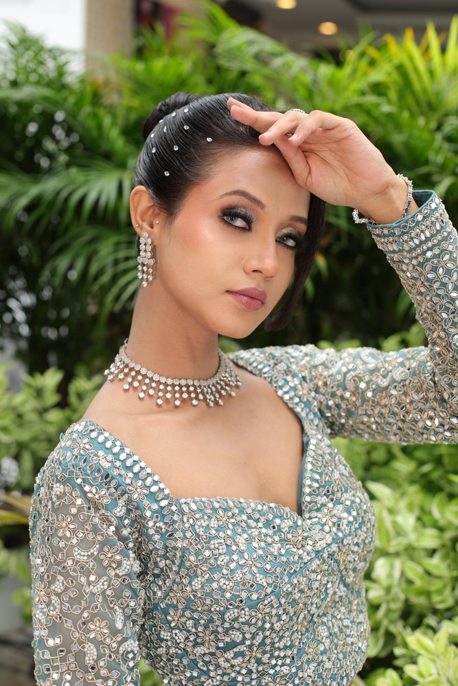 Pre-bridal glam — teal outfit, smoky eyes