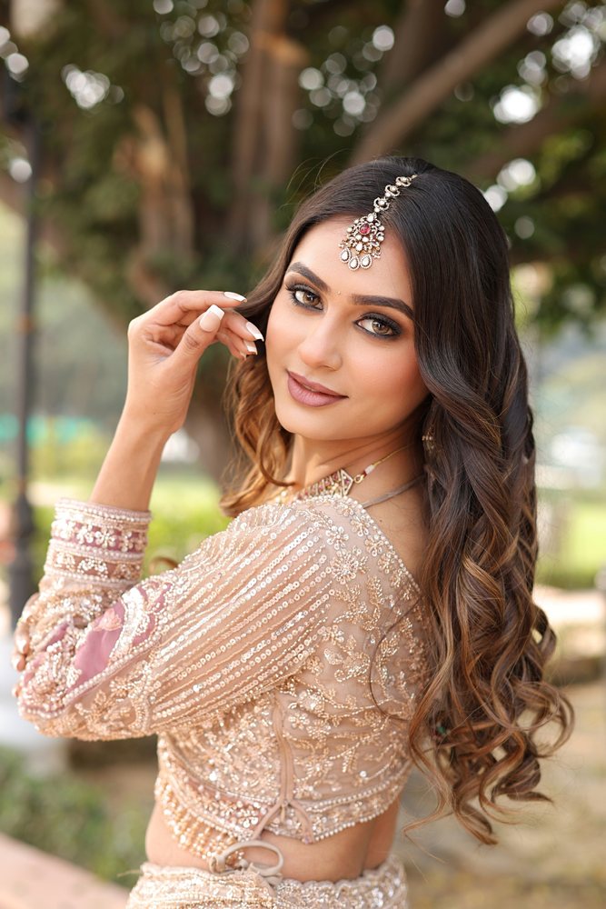 Pre-bridal glam — rose gold lehenga, outdoor
