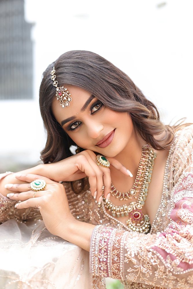 Pre-bridal look — rose gold lehenga, maang tikka